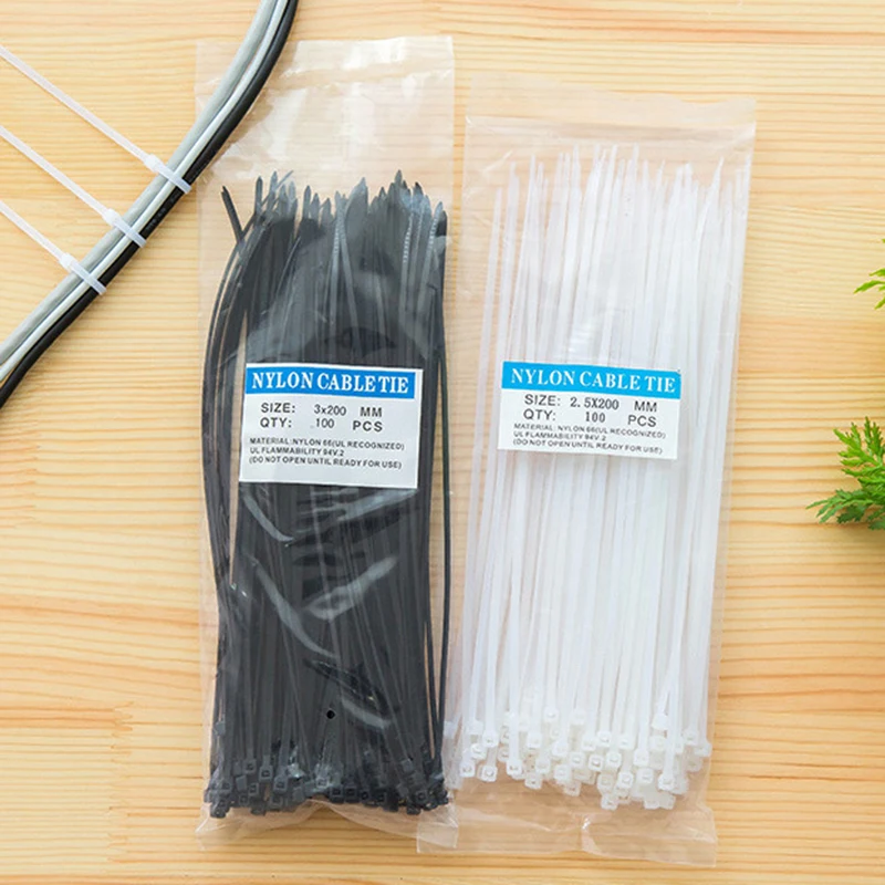 Cintas para la espalda blanca y negra, 100 Uds., lazo de Cable autoadhesivo, envoltura duradera, ZipTies empaquetadas, organizador, arnés de cableado