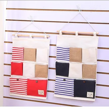 

2020 Hot Creative Home Fabric Storage Bag Cotton and Linen Waterproof Hanging Bag and Wooden Stick and Cotton and Linen Rope