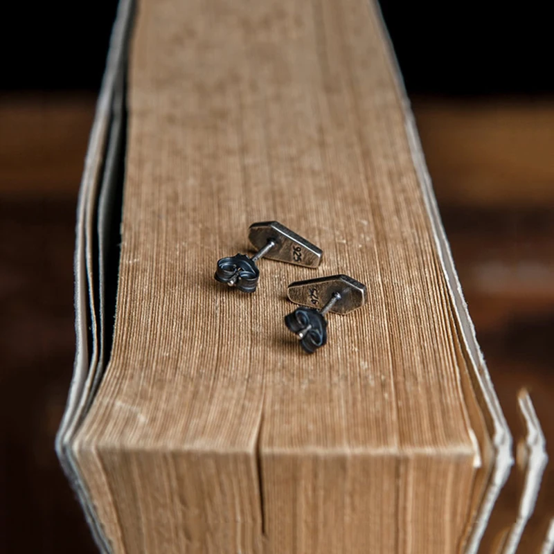 Morbid jewelry in the shape of a coffin