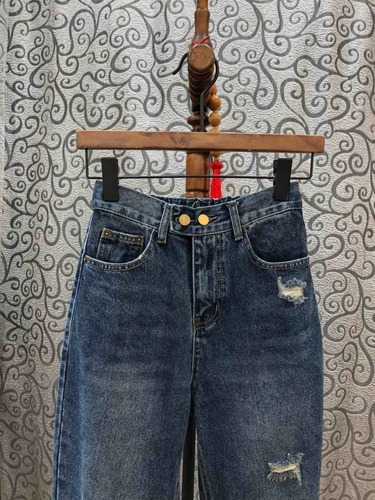 Ранняя осень новые женские симметричные карманы нерегулярные отверстия Украшенные джинсы для отдыха 827