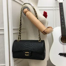 Fashion new female bag snake pattern with red inner chain bag can be single shoulder or crossbody bag