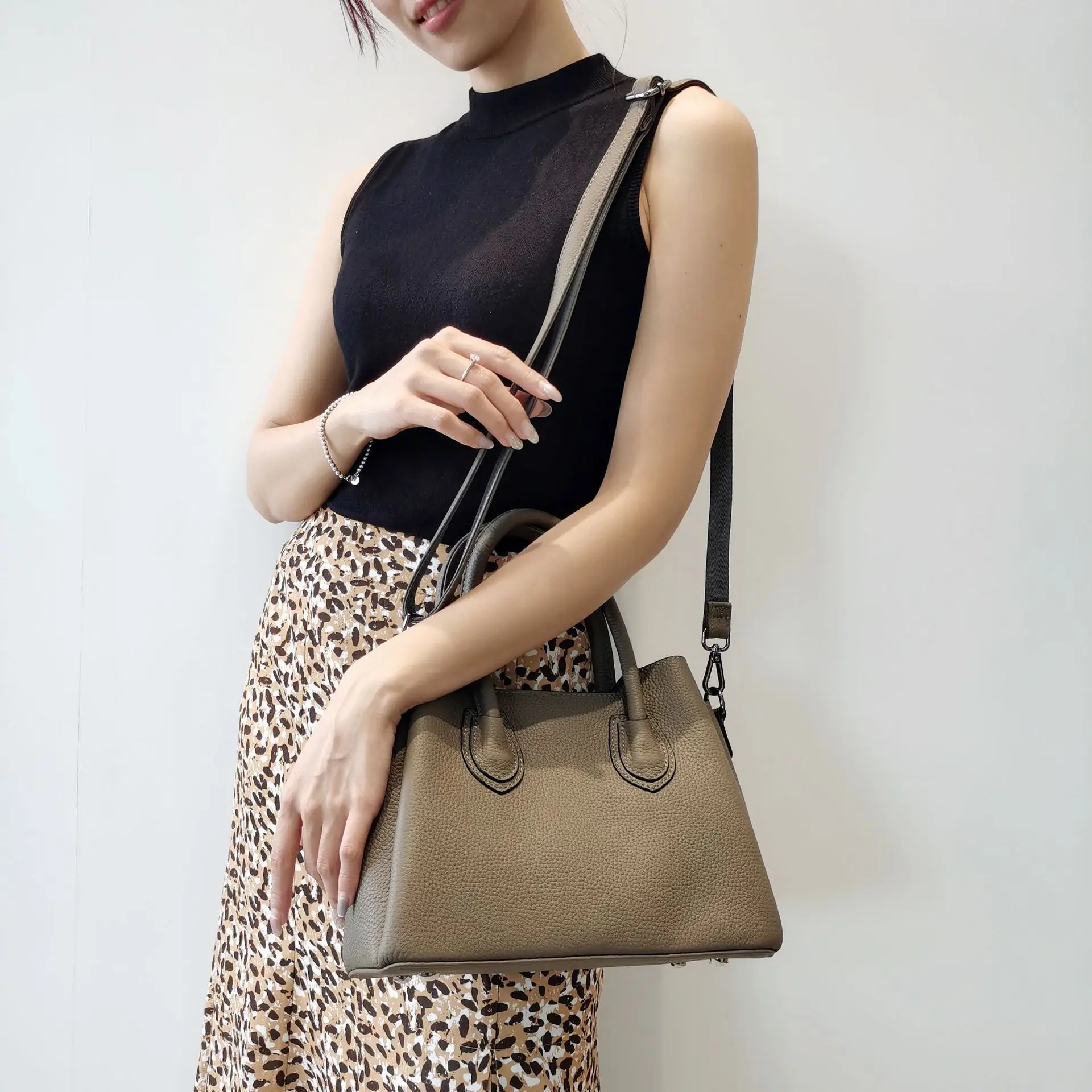 Trapeze-shaped bag with wide shoulder strap :: LICHI - Online fashion store