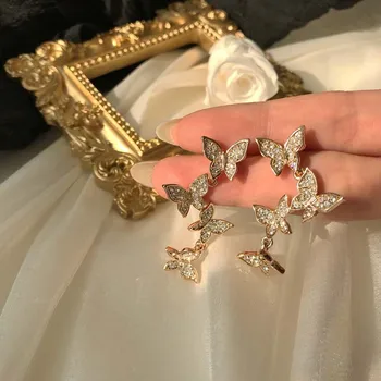 

Xiaomeng Fan Butterfly Earrings Female Personality Super Fairy Gas Diamond Set Ear Clip without Ear Hole 925 Silver Pin Earrings