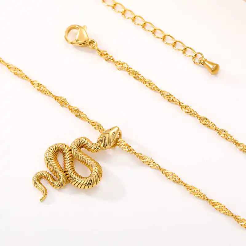 Snake Pendant with an adjustable clasp and intricate chain design laid on a white surface, epitomizing stylish jewelry in women's fashion accessories.