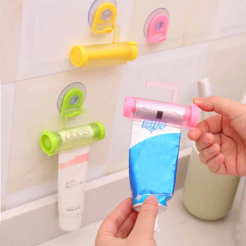 

Rolling Toothpaste Squeezer Toothpaste Dispenser Holder Wall Suction Mounted Toothpaste Tube Squeezer Roller