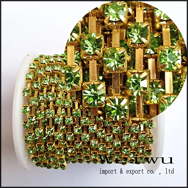 High Qaulity SS8 10 Yards/Roll Peridot Golden Base Sew On Strass Rhinestone Chain