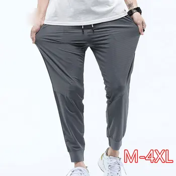

New Loose Casual Trousers Men Quick-drying Bottom Pants Summer Casual Men Hollow Drawstring Elastic Waist Mesh Harem Pants