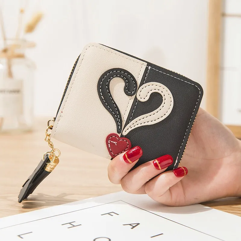 

New coin purse zipper small purse ladies short love student Korean fashion mini color contrast tassel wallet