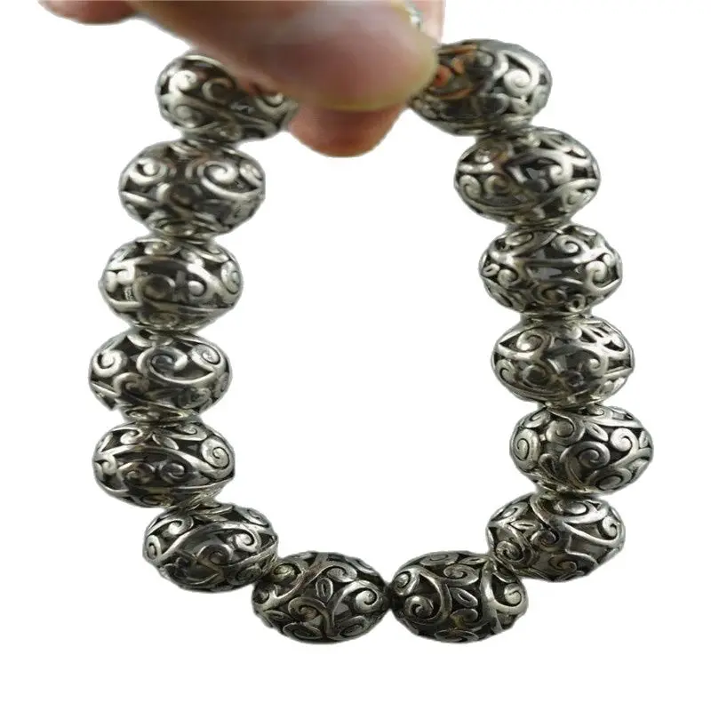 

China Handwork Tibetan Silver Carve Hollow Flower Bead Lucky Bracelet