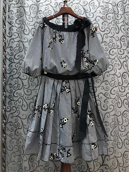 

2020 spring and summer new women's color matching neckline knotted plaid shirt knotted plaid skirt suit 521