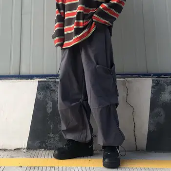 

2020 Spring And Autumn New Youth Popular Solid Color Loose Large Pocket Overalls Fashion Casual Drawstring Pants Black / Grey