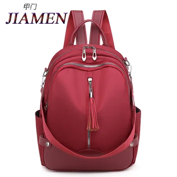 

2020 new casual backpack women's brand Oxford spinning women's backpack women's large-capacity schoolbag tassel casual backpack