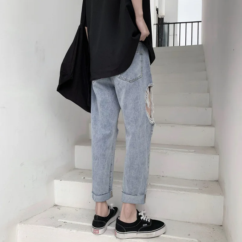 Ripped jeans men's straight loose-fitting trend Korean version of the summer thin nine-point wide-legged pants.