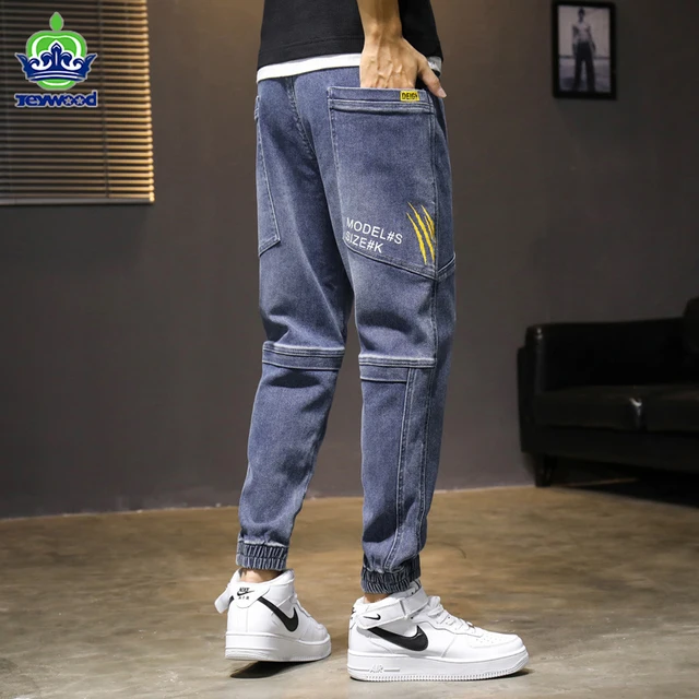 Fashion Streetwear Men's Jeans Splice Denim Cargo Pants Hip Hop Pant Men Slack Bottom Joggers Hombre Harem Trousers Male 4 5XL 1