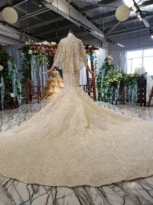 BacklakeGirls Handmade Champagne Mermaid Wedding Dresses Sexy Sleeveless Lace Flower Trumpet Bride Wedding Gowns With Short Cape