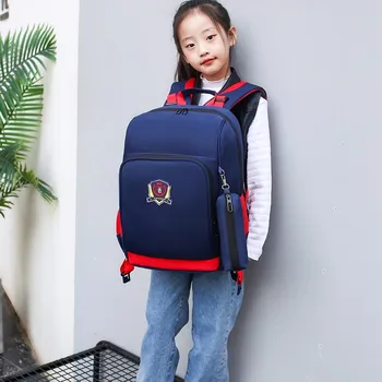 

Hot Orthopedic Children Schoolbag Fashion British Style Boys and Girls Waterproof Backpack Schoolbag Lightweight Youth Backpacks