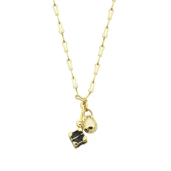 

Wholesale high quality key chain hanging gift box dinosaur egg medium long necklace couple double Pendant Necklace