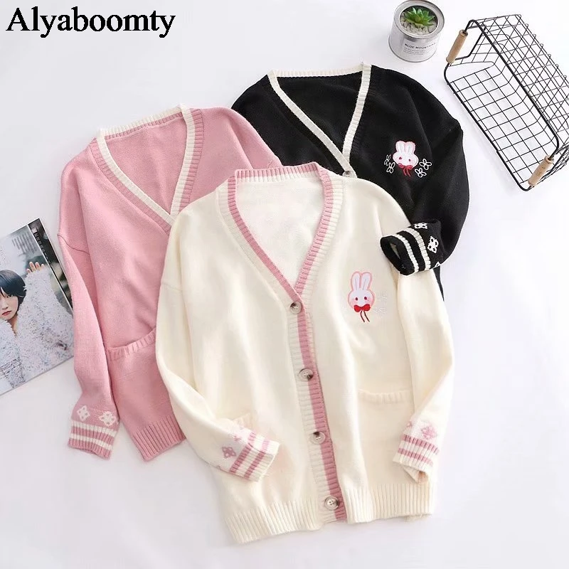 navy blue pink sweater