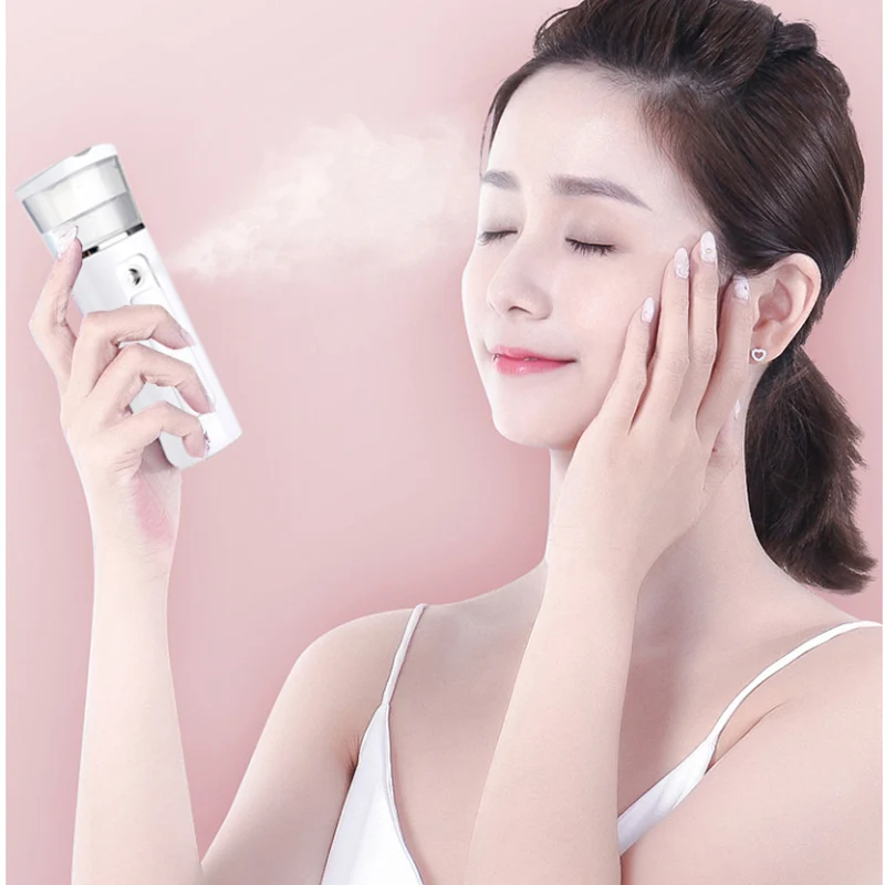 

Skin care moisturizing beauty instrument steamed face device mini USB charging mobile power facial spray nano spray body spray