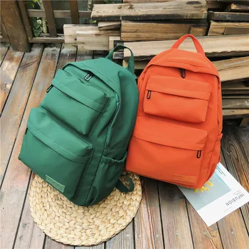 

2020 simple double pocket junior high school student schoolbag girl cute large capacity water repellent backpack backpack
