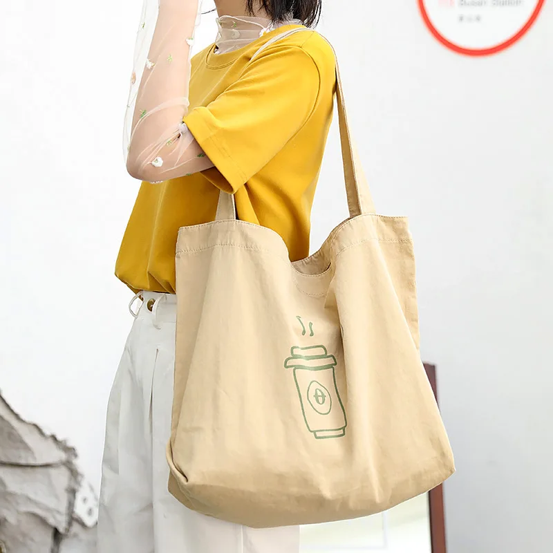 

Korean version of simple art canvas handbags all-match lazy printed handbag casual large-capacity shopping shoulder bag