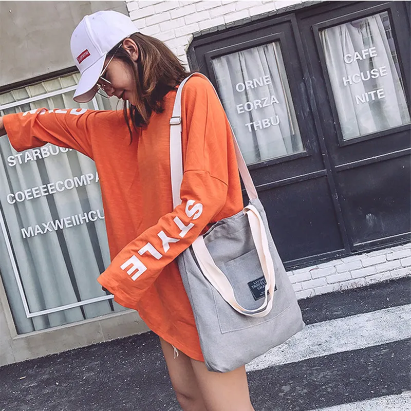 

New canvas women's bag student shoulder high-capacity messenger Joker portable bags