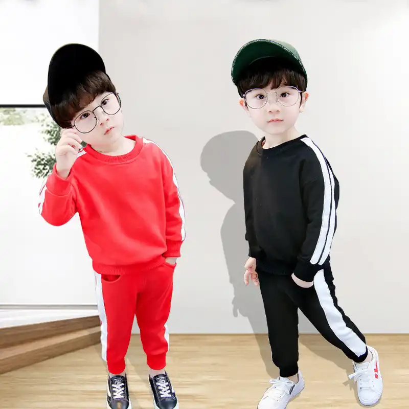 black pants with red stripe outfit