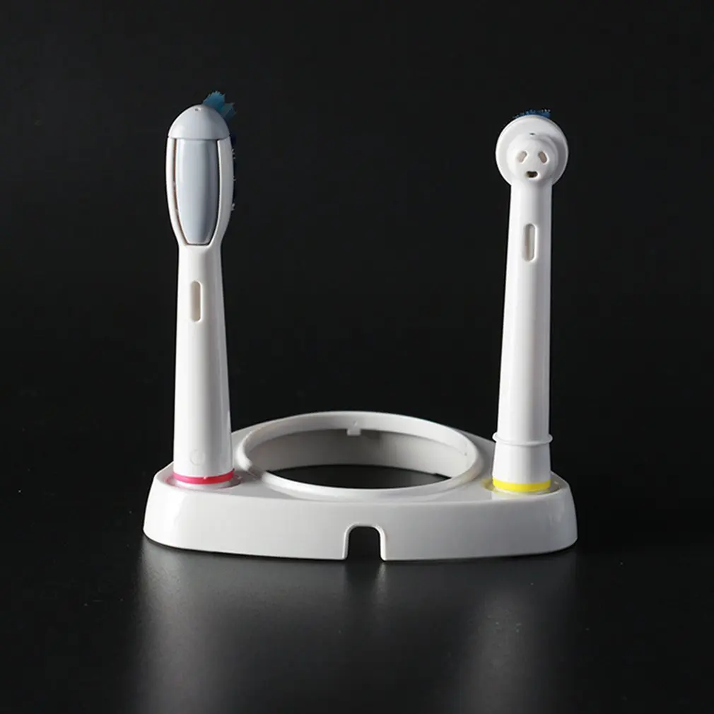 2PCS New Electric Toothbrush Base Stand Support Brush Head Holder For Braun Oral B Electric Toothbrushes Home Bathroom Tools 2PCS New Electric Toothbrush Base Stand Support Brush Head Holder For Braun Oral B Electric Toothbrushes Home Bathroom Tools