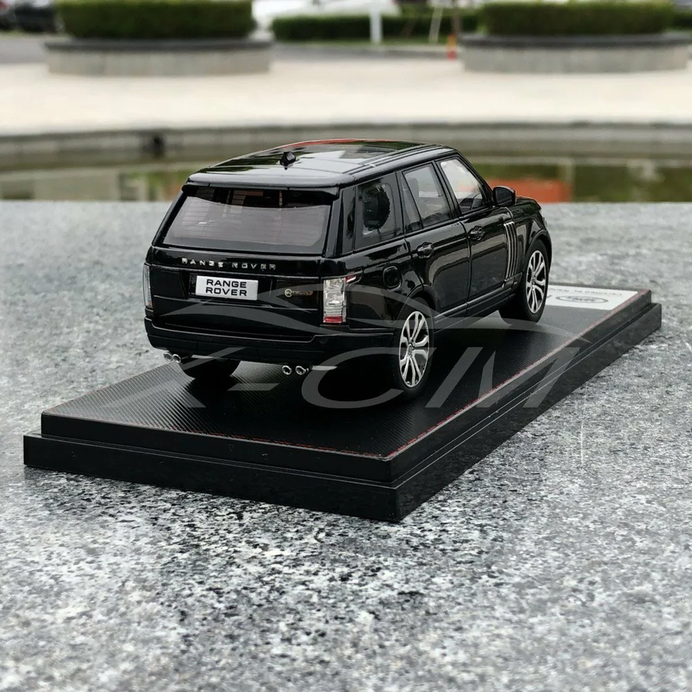 Модель автомобиля ЖК Модели Range Rover 1:43 (черный) + маленький подарок!| |