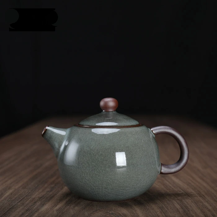 

Longquan Celadon High Iron Content Handmade Ge Kiln Teapot with Infuser Ceramic Single Pot