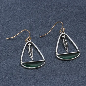 

Emerald Stone Earrings Gold Silver Retro Earrings Female Antique Leaf Paragraph Europe and America Generous Earrings