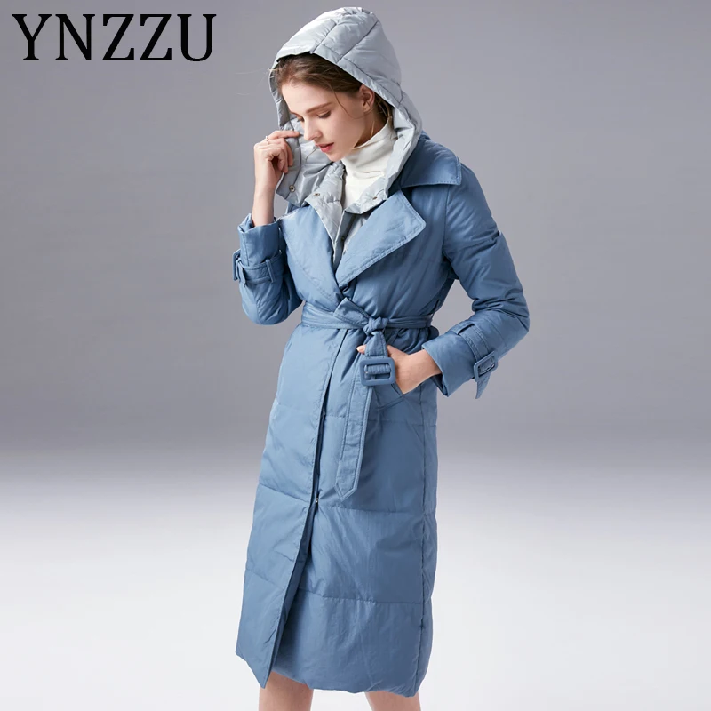 

YNZZU 2020 New Spring Winter Elegant Women's Down Jacket 90% White Duck Down Coat Women Hooded Thicken Warm Outwear Sashes A1447