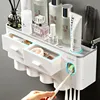 Magnetic Adsorption Inverted Toothbrush Holder Automatic Toothpaste Squeezer Dispenser Storage Rack Bathroom Accessories Home ► Photo 1/6