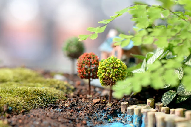 Create a whimsical fairy garden with 100PCS Fairy Garden Miniature Trees.