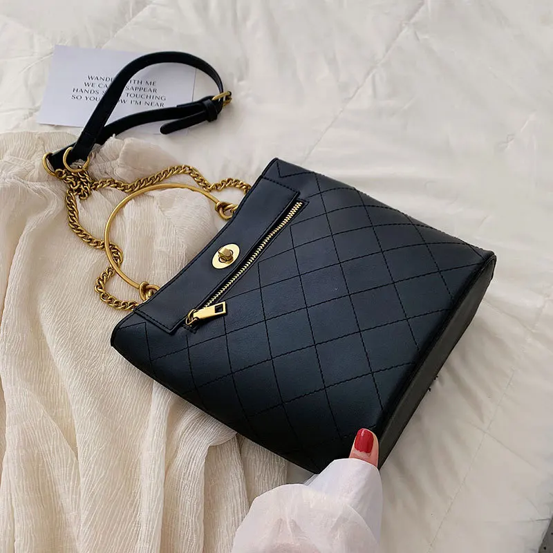 

Women's small bag 2019 summer new Korean version of the ocean rhombic portable slung bucket bag fashion wild shoulder bag tide