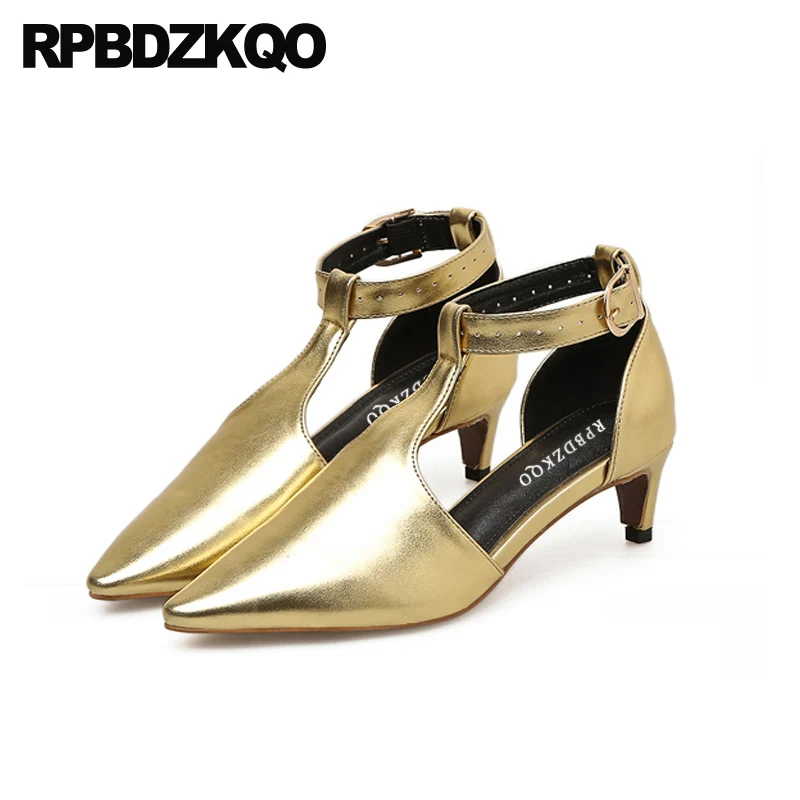 ladies gold pumps