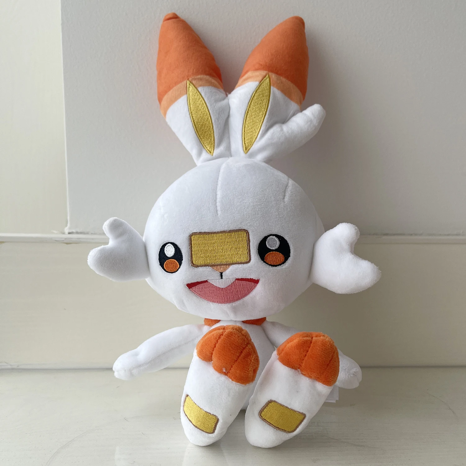 Peluche Pokémon Flambino Scorbunny