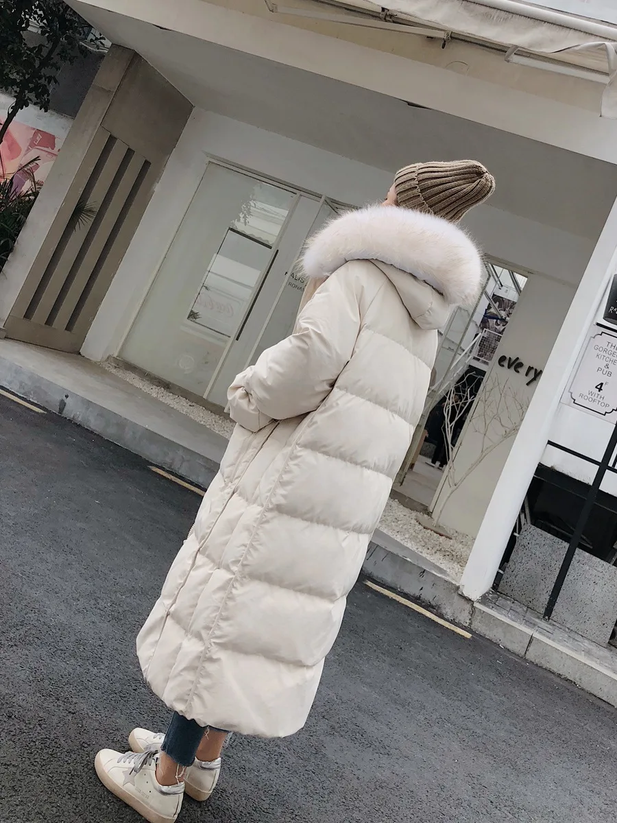 Осень и Новинка зимы Стиль Dongdaemun белый пуховик Для женщин средней длины Толстая записная книжка С ПЕРЕПЛЕТОМ с подходит большой меховой воротник Сапоги выше колена