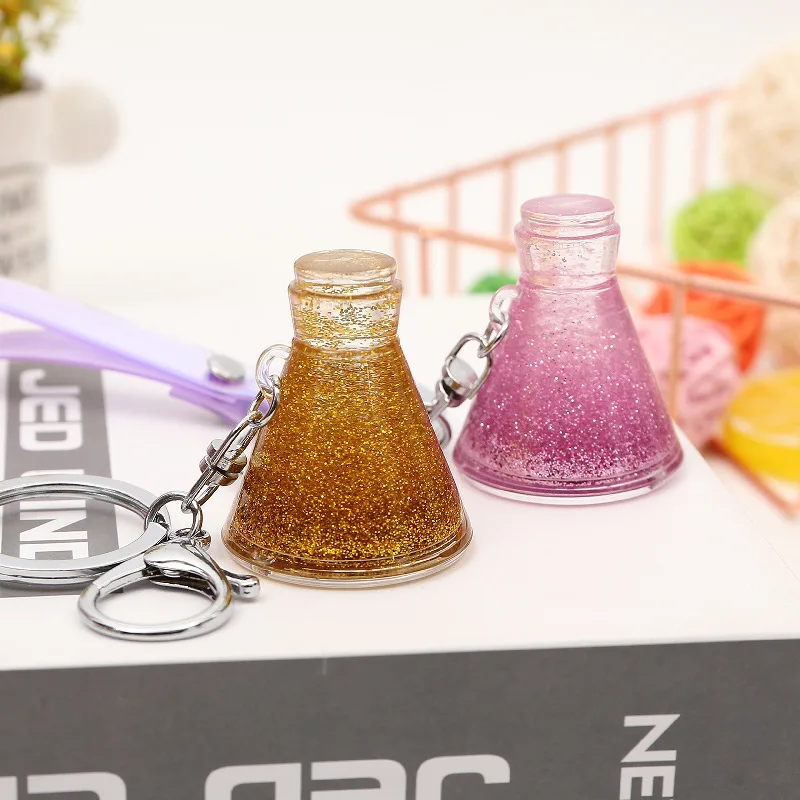 

Fashion Water bottle Moving Liquid Key Ring fantasy keychain Glitter Quicksand Keychain Car Key Pendant Creative Birthday Gift