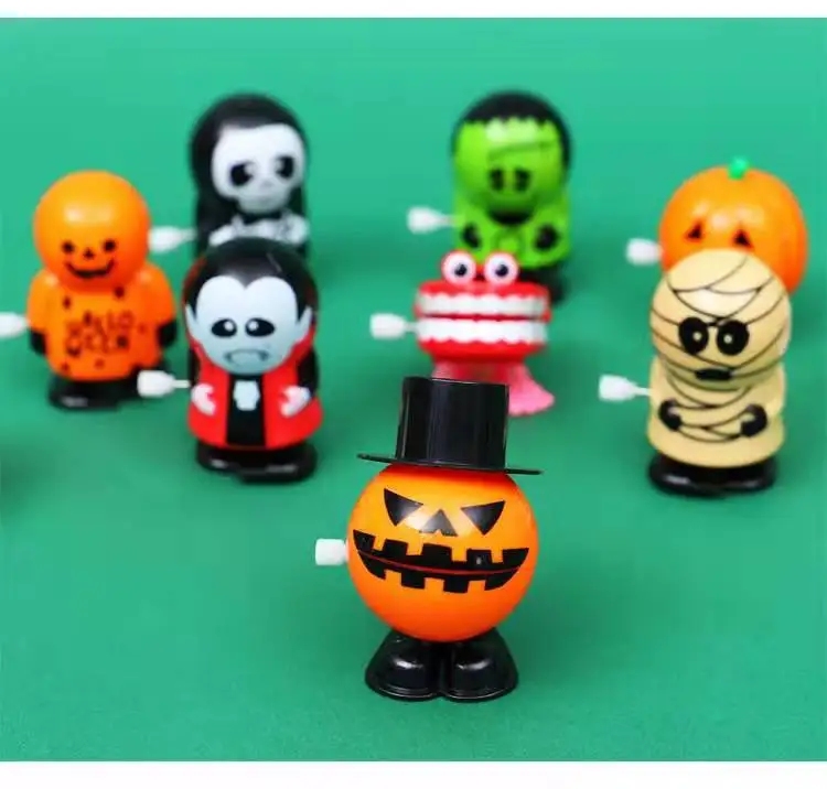 

Creative Funny Clockwork Jumping Teeth/Jumping Frog/ Going Zombie Vampire Ghost Pumpkin Head Halloween Baby Christmas toy