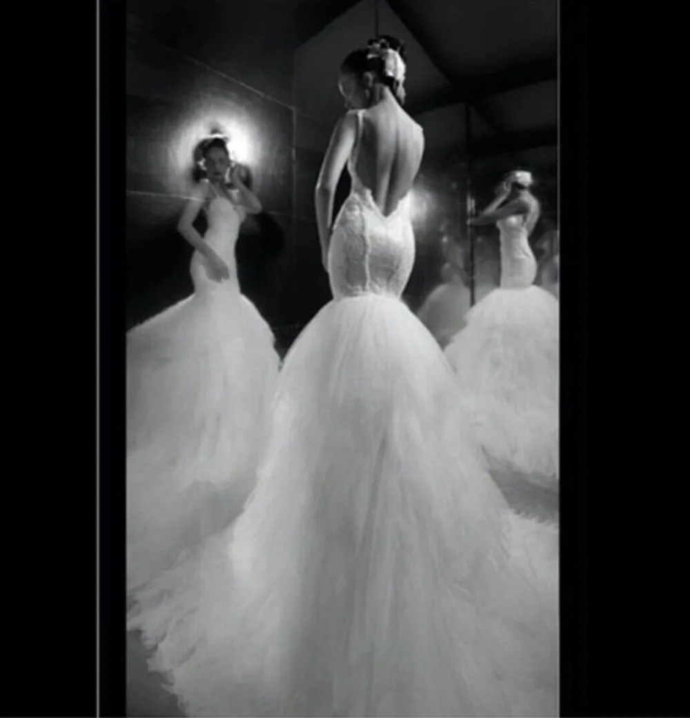 

2015 Designer Spaghetti Strap Appliqued Beaded Pearls Sleeveless Backless Mermaid Wedding Dresses