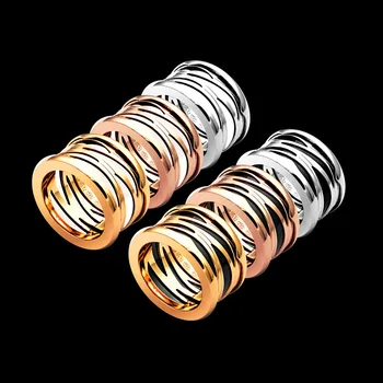 

Titanium steel jewelry letter hollow water ripple black and white ceramic ring lovers wide version maze ceramic ring