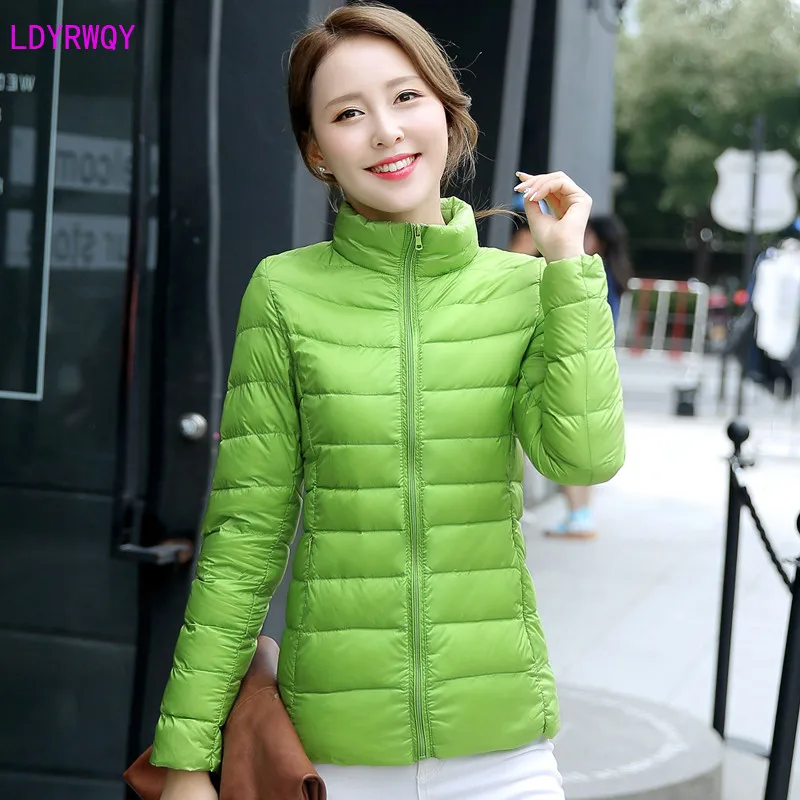 

2019 autumn and winter new large size women's solid color stand collar zipper pocket long-sleeved slim Cotton jacket