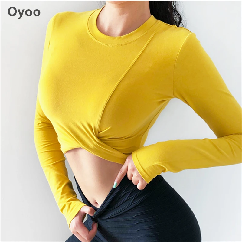 Oyoo/желтая футболка Femme с длинными рукавами, с закрученным подолом, топ для йоги с отверстием для большого пальца, Укороченные спортивные майки, топы Спортивные для женщин