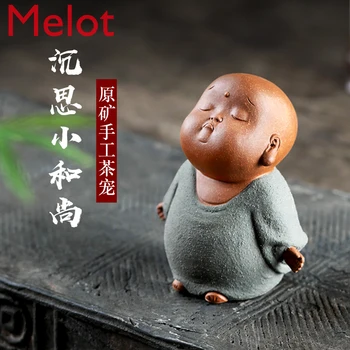 

Yixing Raw Ore Purple Sand Handmade Creative Tea Ceremony Decoration Tea Pet Descending Slope Mud Meditation Little Monk