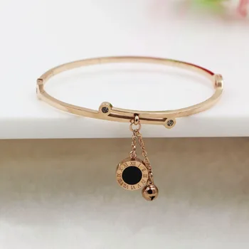 

Roman numeral round cake black and white double-sided shell bell bracelet female with diamond buckle titanium steel jewelry