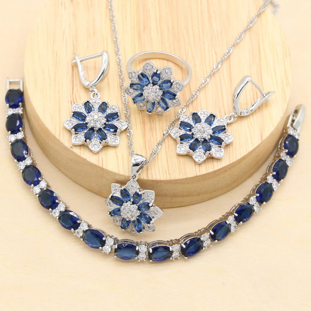 

Женский ювелирный комплект из колье, серёг, браслета и кольца, из серебра 2022 пробы