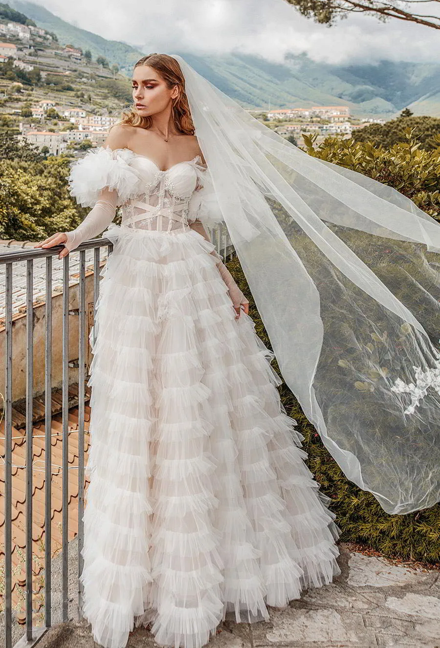 katherine-joyce-2019-bridal-long-sleeves-off-the-shoulder-sweetheart-neckline-lightly-embellished-bodice-tiered-skirt-romantic-a-line-wedding-dress-short-train-6-mv