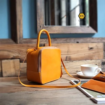 

The new 2020 original hand-made vegetable tanned leather bag with cow leather on one shoulder and portable messenger bag