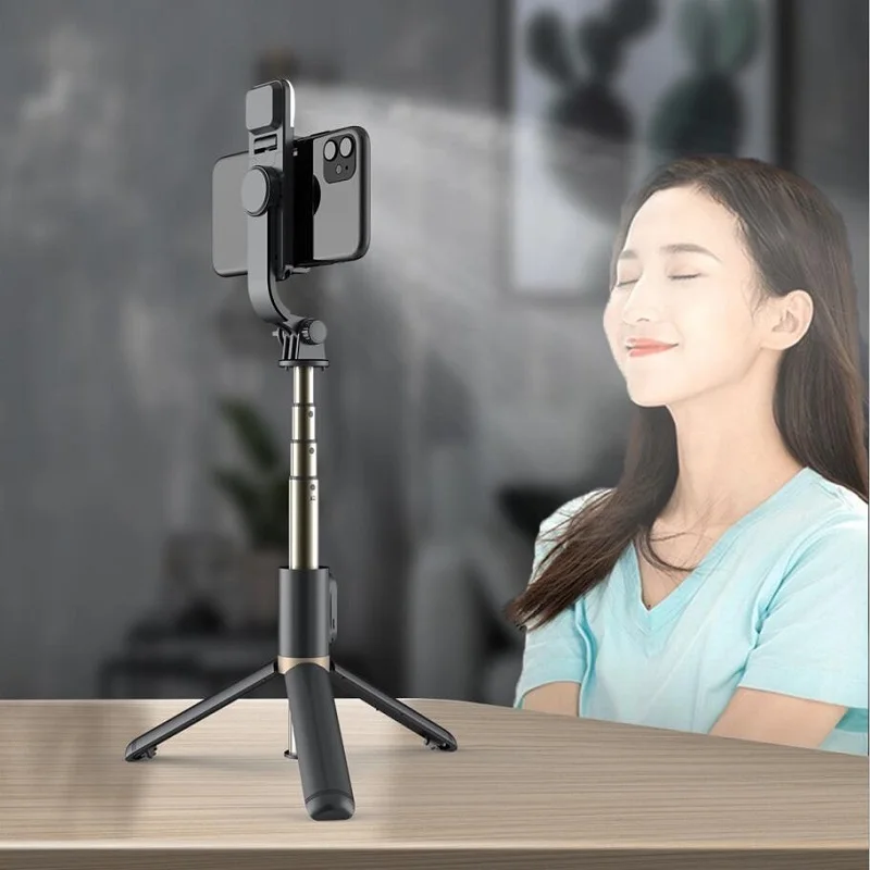 Q03S Bluetooth selfie stick ampliable mini trípode con luz de relleno LED y el obturador de control para Android IOS